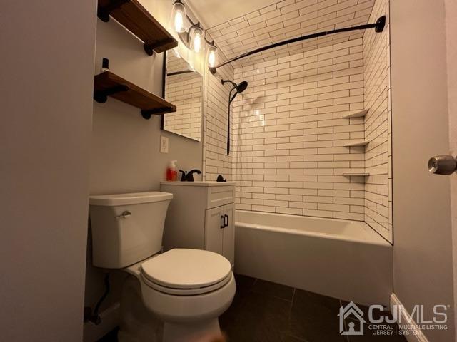 89 Leo Street Edison, NJ 08817 - Photo 9 of 31 a bathroom with a toilet and a shower