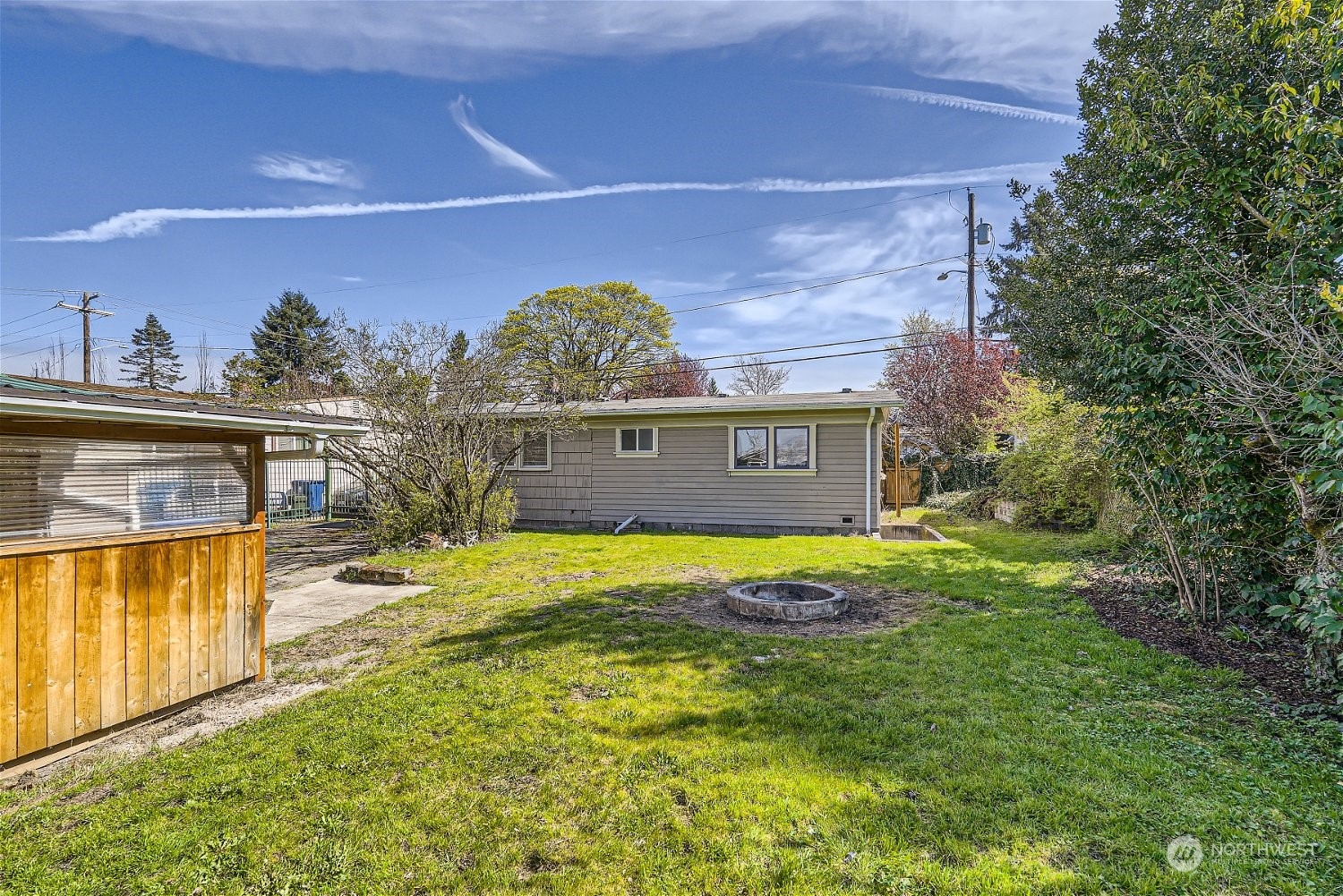 675 Edmonds Avenue Northeast Renton, WA 98056 - Photo 9 of 14 a view of swimming pool with a yard