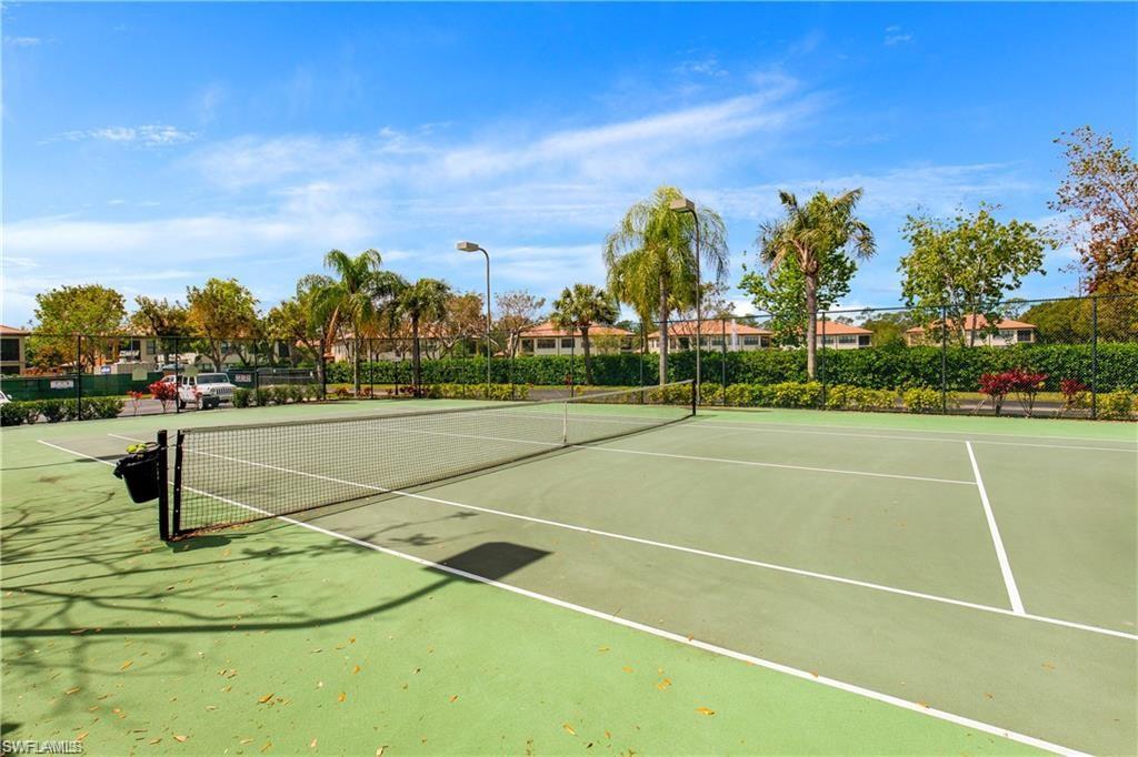 1190 Reserve Way, Unit 206 Naples, FL 34105 - Photo 32 of 35 a view of a tennis court