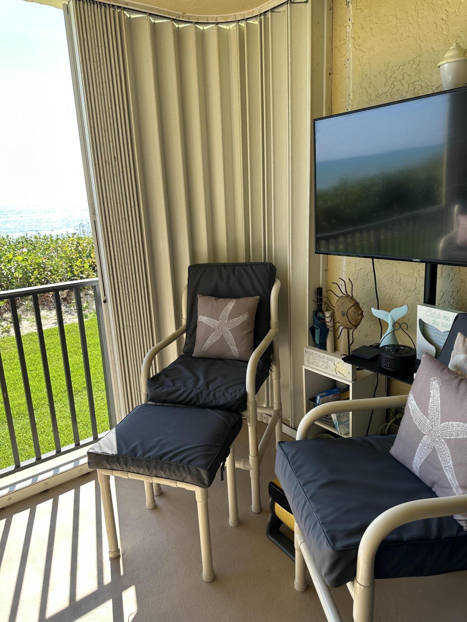 7370 South Ocean Drive, Unit 215 Jensen Beach, FL 34957 - Photo 23 of 51 a view of balcony with furniture