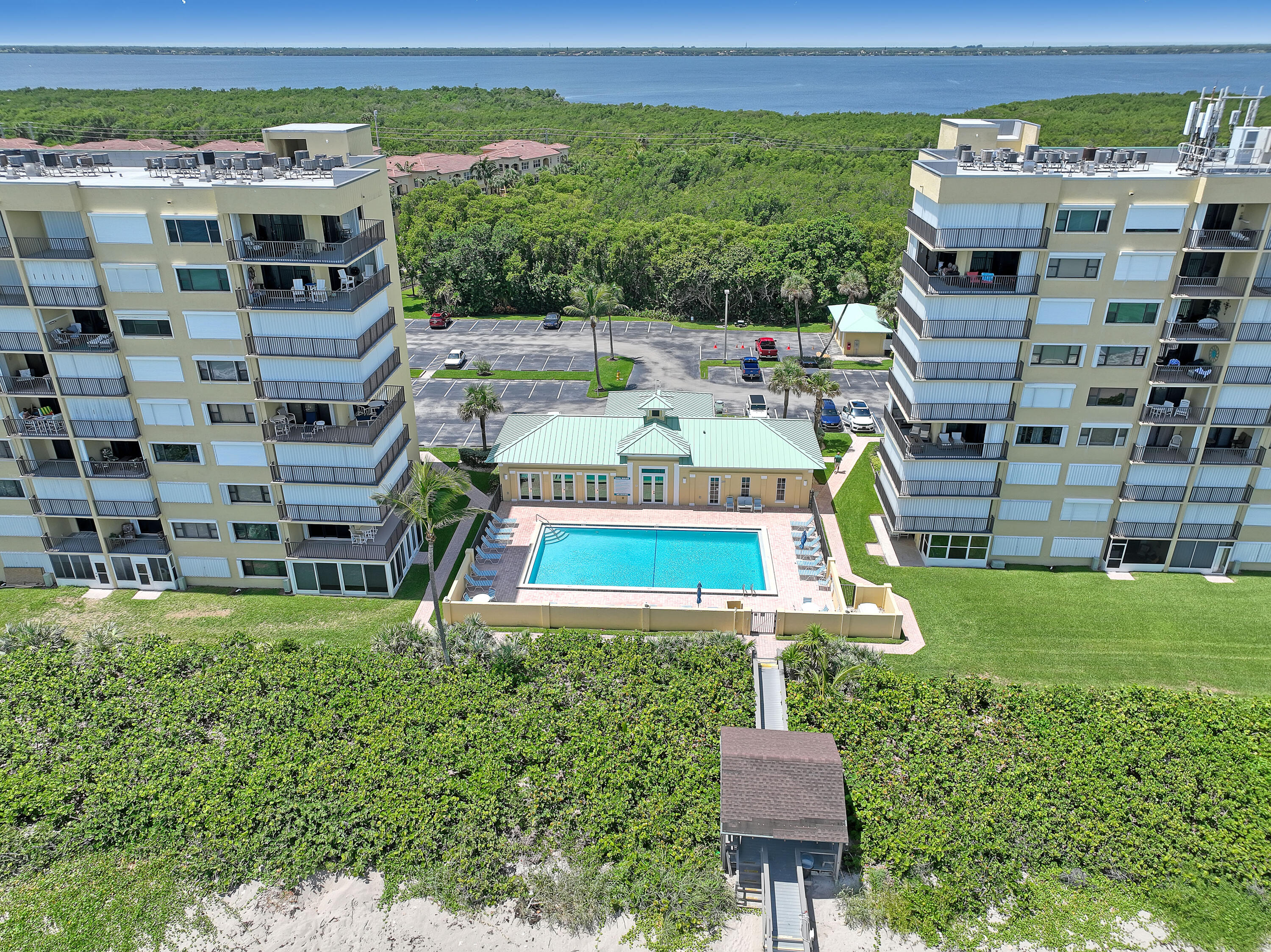 7370 South Ocean Drive, Unit 215 Jensen Beach, FL 34957 - Photo 37 of 51 a bird view of a building with a yard
