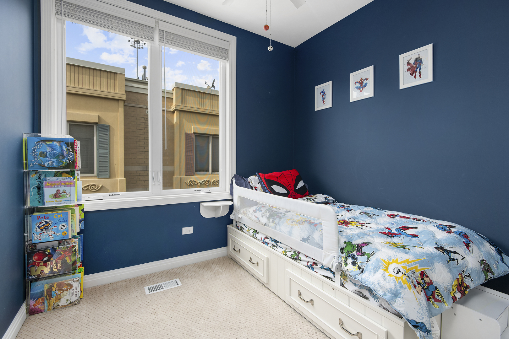 520 North Peoria Street Chicago, IL 60642 - Photo 11 of 20 a bed room with a bed and a dresser
