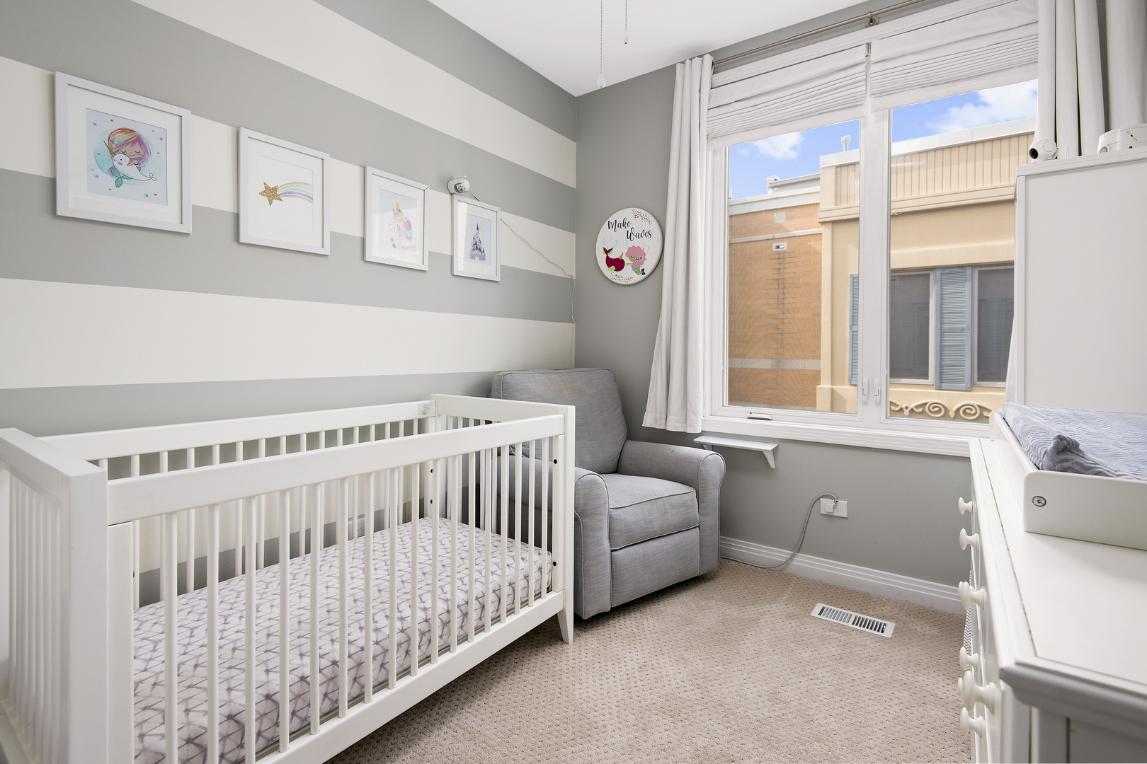 520 North Peoria Street Chicago, IL 60642 - Photo 13 of 20 a bedroom with a bed and a window