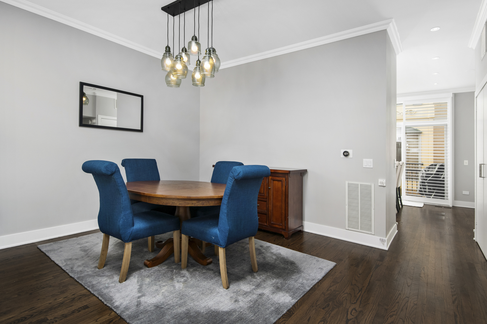 520 North Peoria Street Chicago, IL 60642 - Photo 5 of 20 a view of a dining room with furniture wooden floor and chandelier