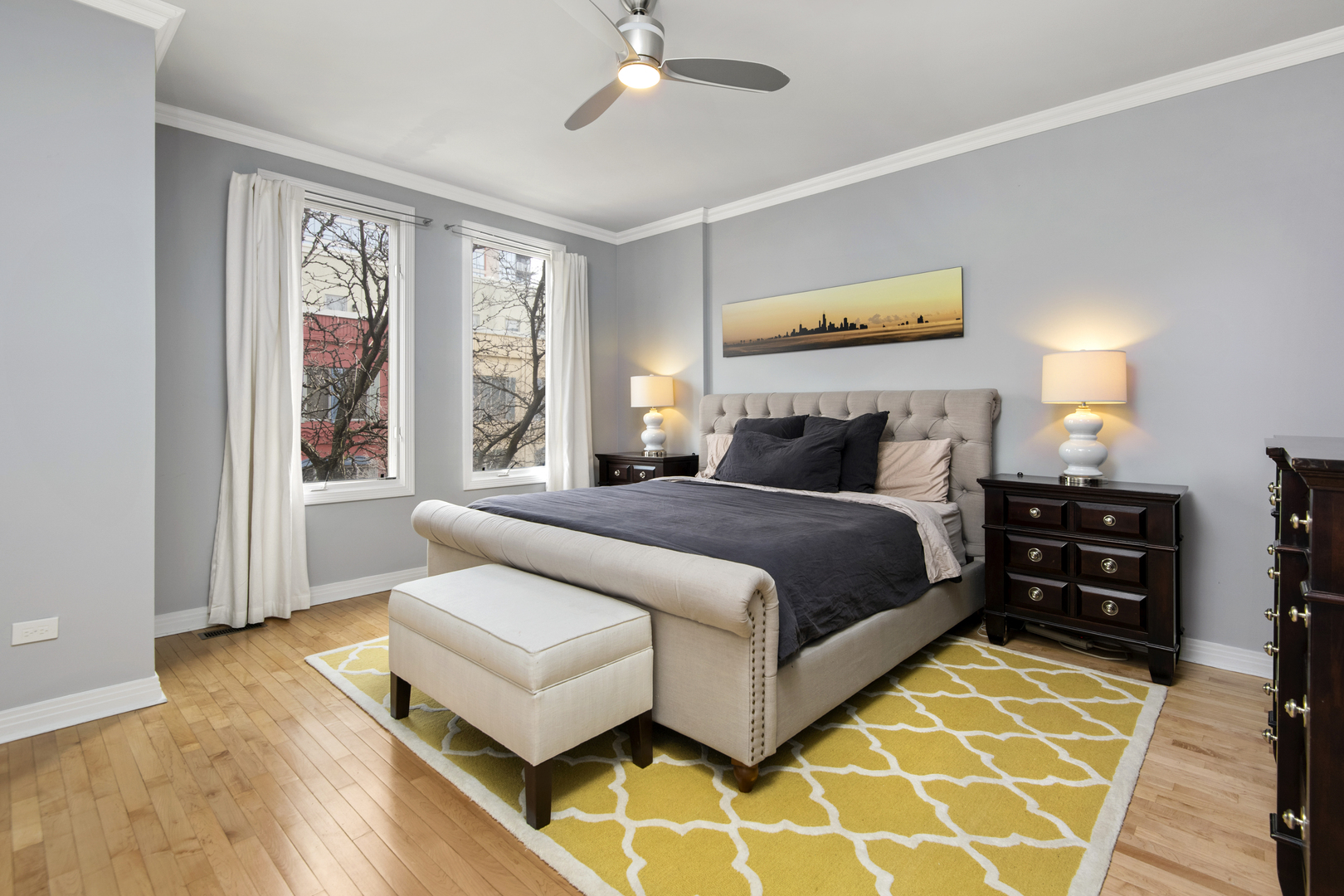 520 North Peoria Street Chicago, IL 60642 - Photo 9 of 20 a bedroom with a bed and wooden floor