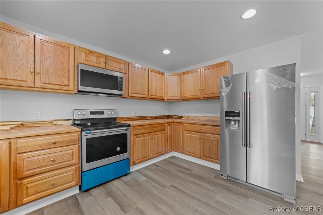 3816 Cappahosic Road Gloucester, VA 23061 - Photo 10 of 28 Kitchen with butcher block countertop
