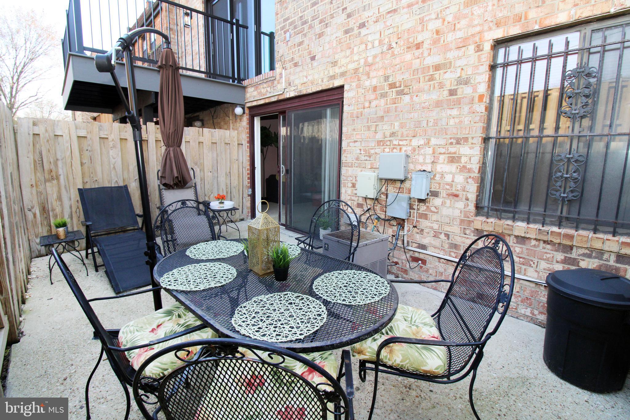 592 Brummel Court Northwest, Unit 592 Washington, DC 20012 - Photo 13 of 13 a view of a dining room with furniture