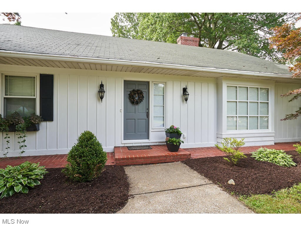 2468 Ridgewood Road Akron, OH 44313 - Photo 5 of 21 Property entrance featuring a porch