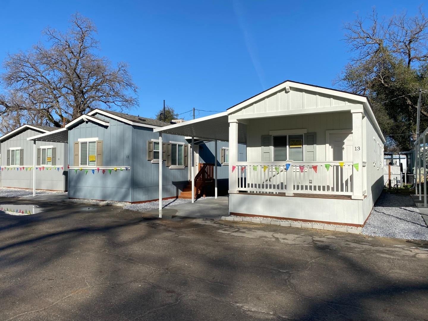5812 Cedars Road, Unit 13 Redding, CA 96001 - Photo 2 of 12 a view of a house with a yard