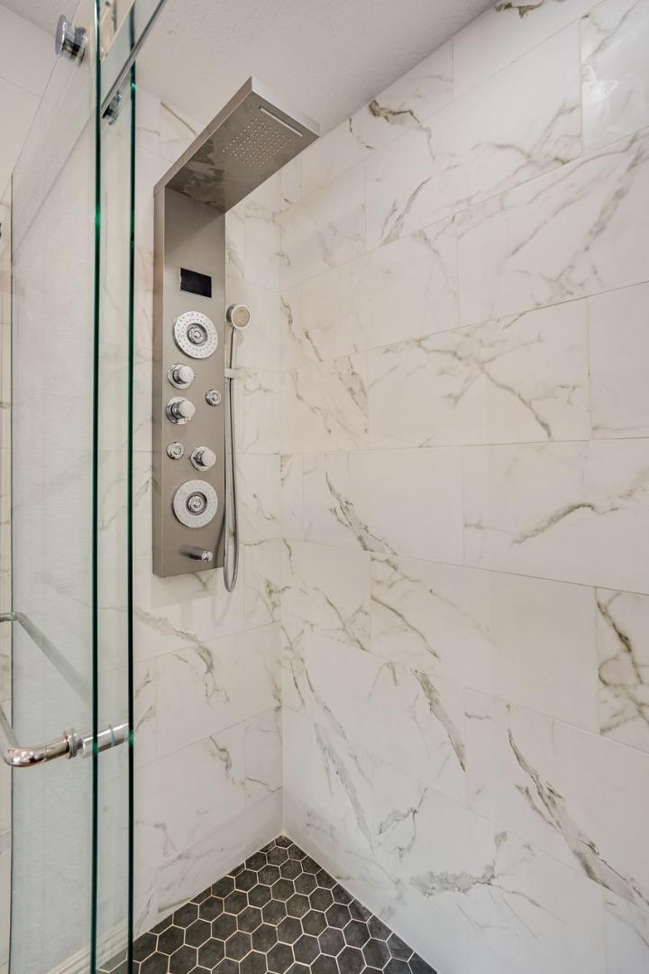 6586 Broadacres Drive San Jose, CA 95120 - Photo 16 of 37 a bathroom with a shower
