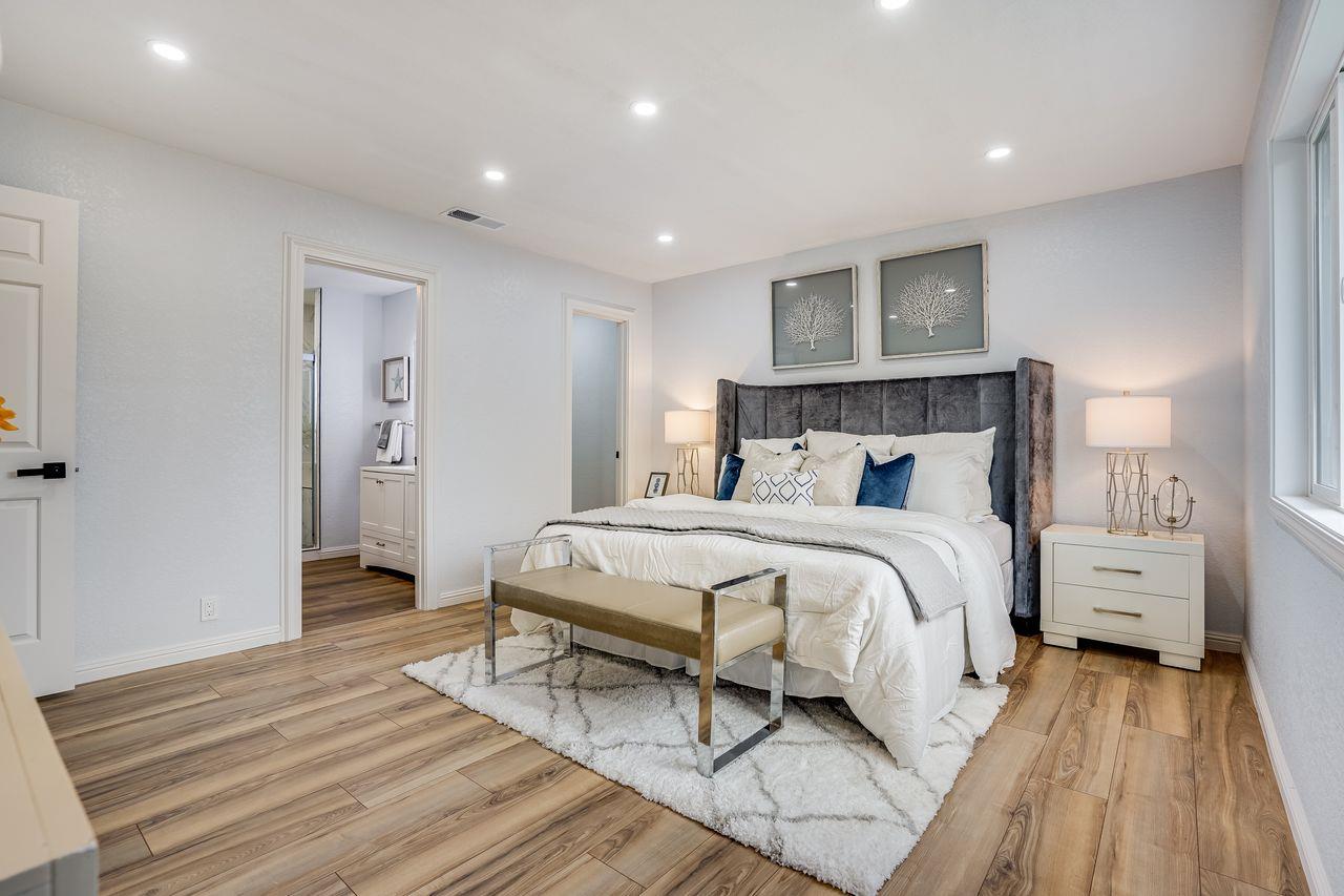 6586 Broadacres Drive San Jose, CA 95120 - Photo 17 of 37 a bedroom with a bed and wooden floor