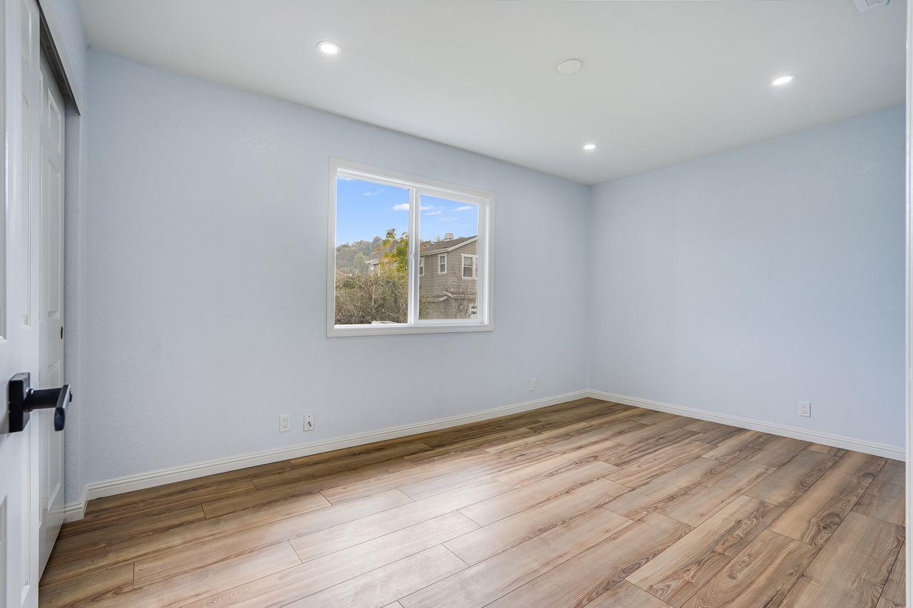 6586 Broadacres Drive San Jose, CA 95120 - Photo 26 of 37 a view of empty room with wooden floor