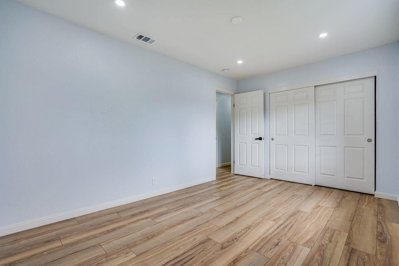 6586 Broadacres Drive San Jose, CA 95120 - Photo 27 of 37 a view of an empty room with wooden floor
