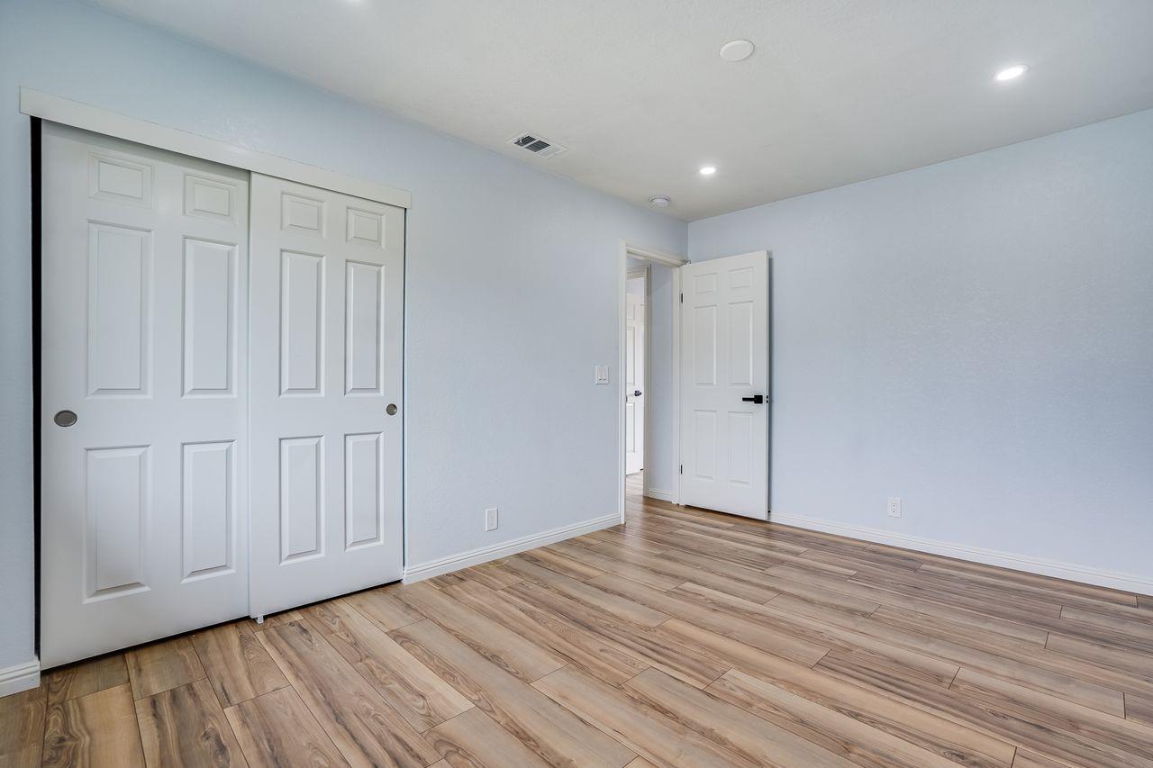 6586 Broadacres Drive San Jose, CA 95120 - Photo 29 of 37 a view of an empty room with wooden floor