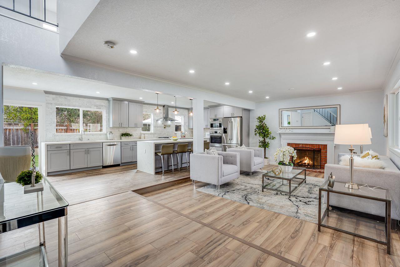 6586 Broadacres Drive San Jose, CA 95120 - Photo 4 of 37 a living room with furniture wooden floor and a fireplace