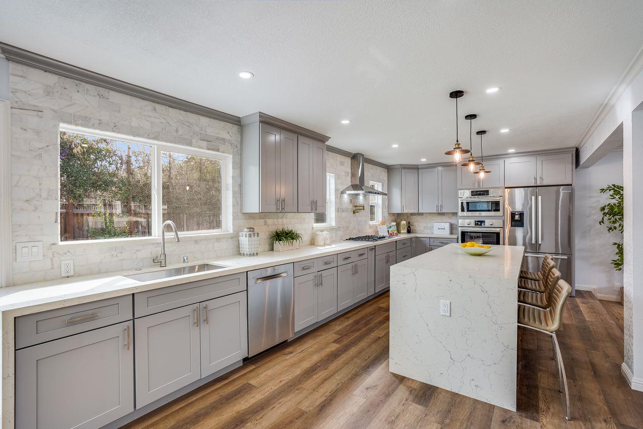 6586 Broadacres Drive San Jose, CA 95120 - Photo 7 of 37 a kitchen with white cabinets and sink