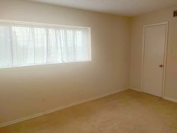 an empty room with a window