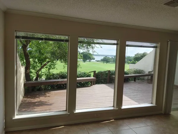 a view of a room that has a large window