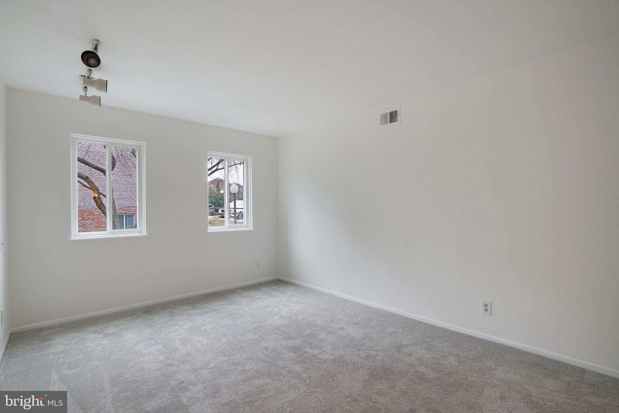 5020 7th Road South, Unit 102 Arlington, VA 22204 - Photo 16 of 30 a view of an empty room with a window