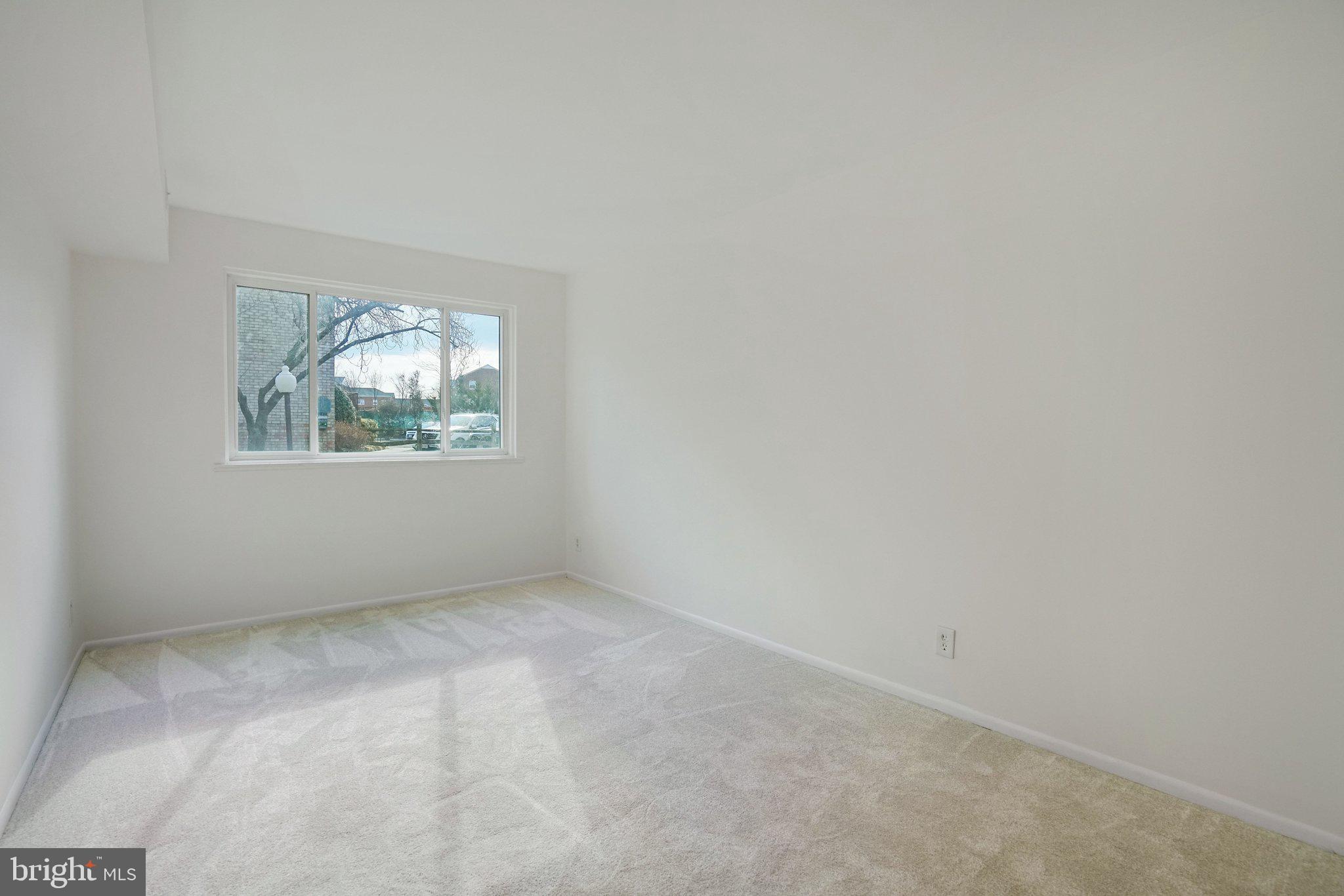 5020 7th Road South, Unit 102 Arlington, VA 22204 - Photo 22 of 30 an empty room with windows