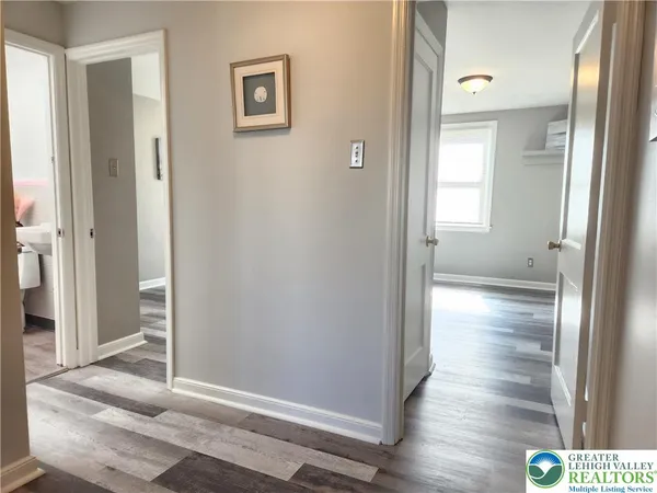 a view of a room that has a window