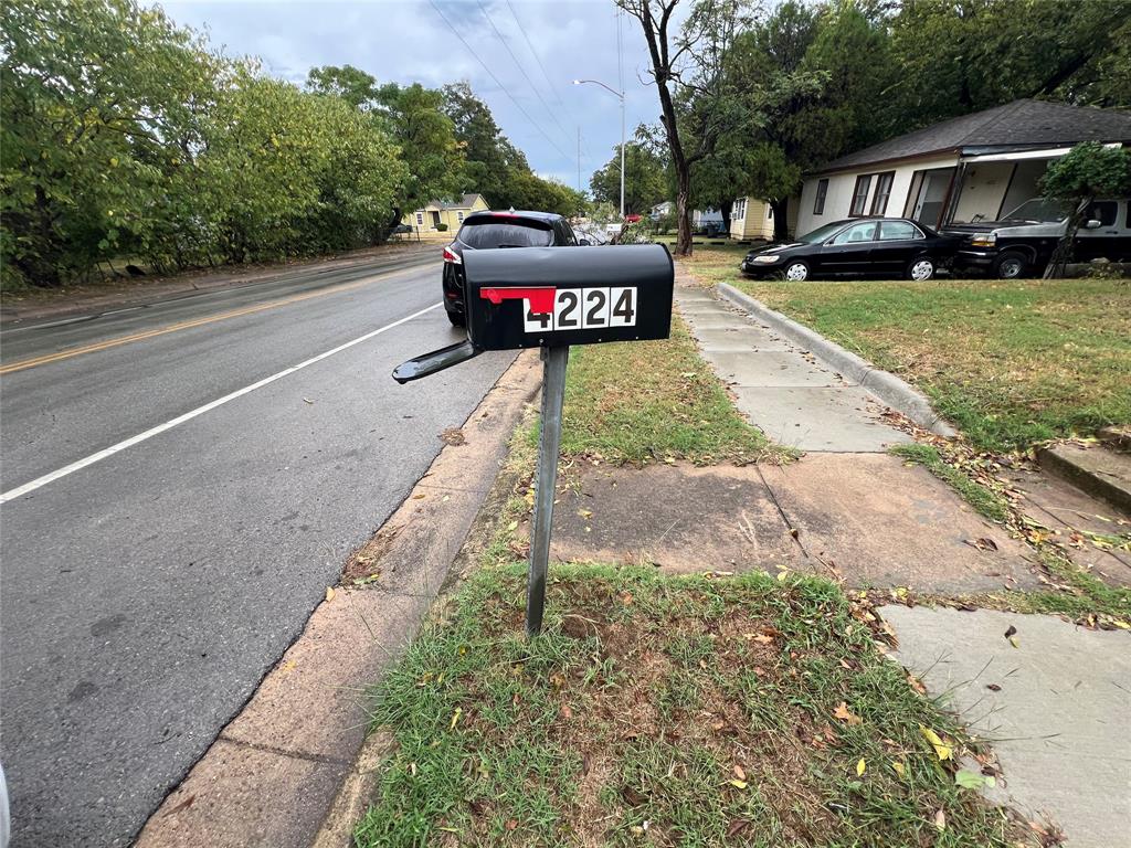 4224 Ramey Avenue Fort Worth, TX 76105 - Photo 2 of 19 View of asphalt street with curbs and street lighting