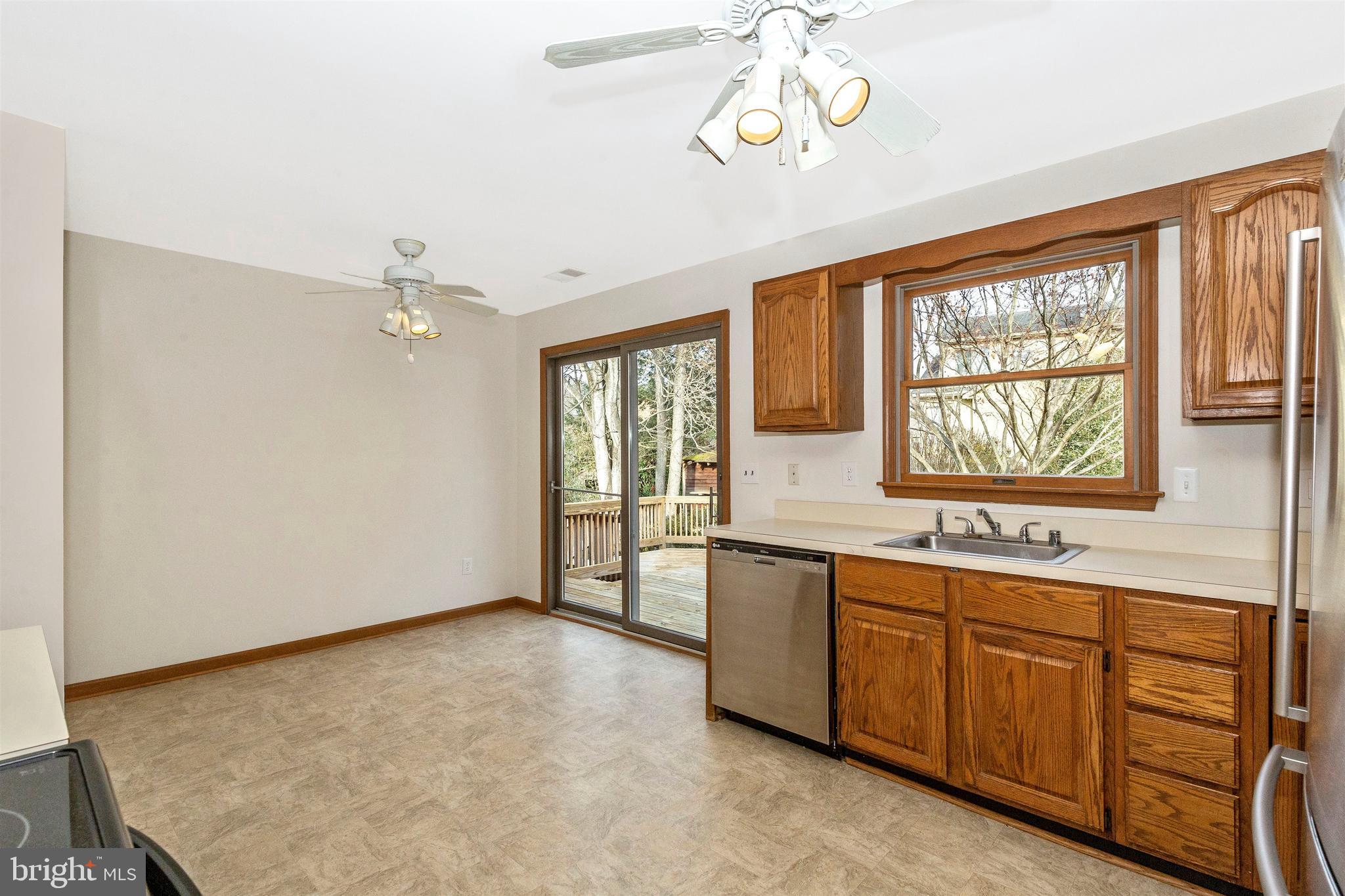 6915 Fox Chase Road New Market, MD 21774 - Photo 36 of 56 Eat in area with slider to huge deck