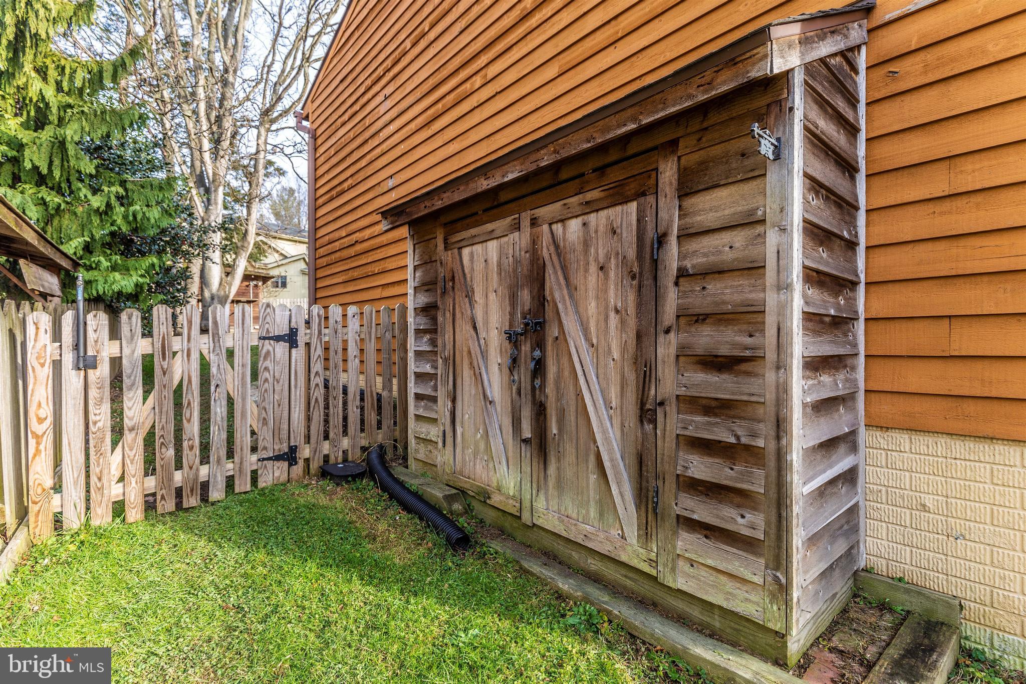 6915 Fox Chase Road New Market, MD 21774 - Photo 10 of 56 Side yard storage for rakes and shovels