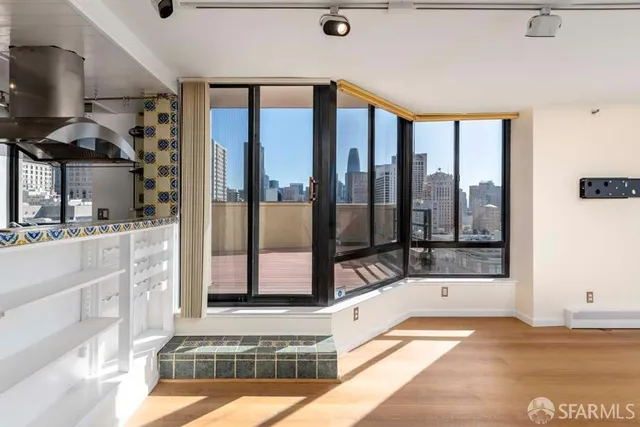a view of a bathroom with a tub and window