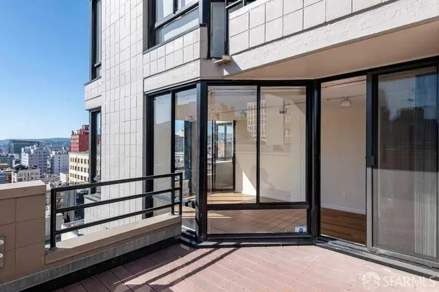 a view of a balcony with door