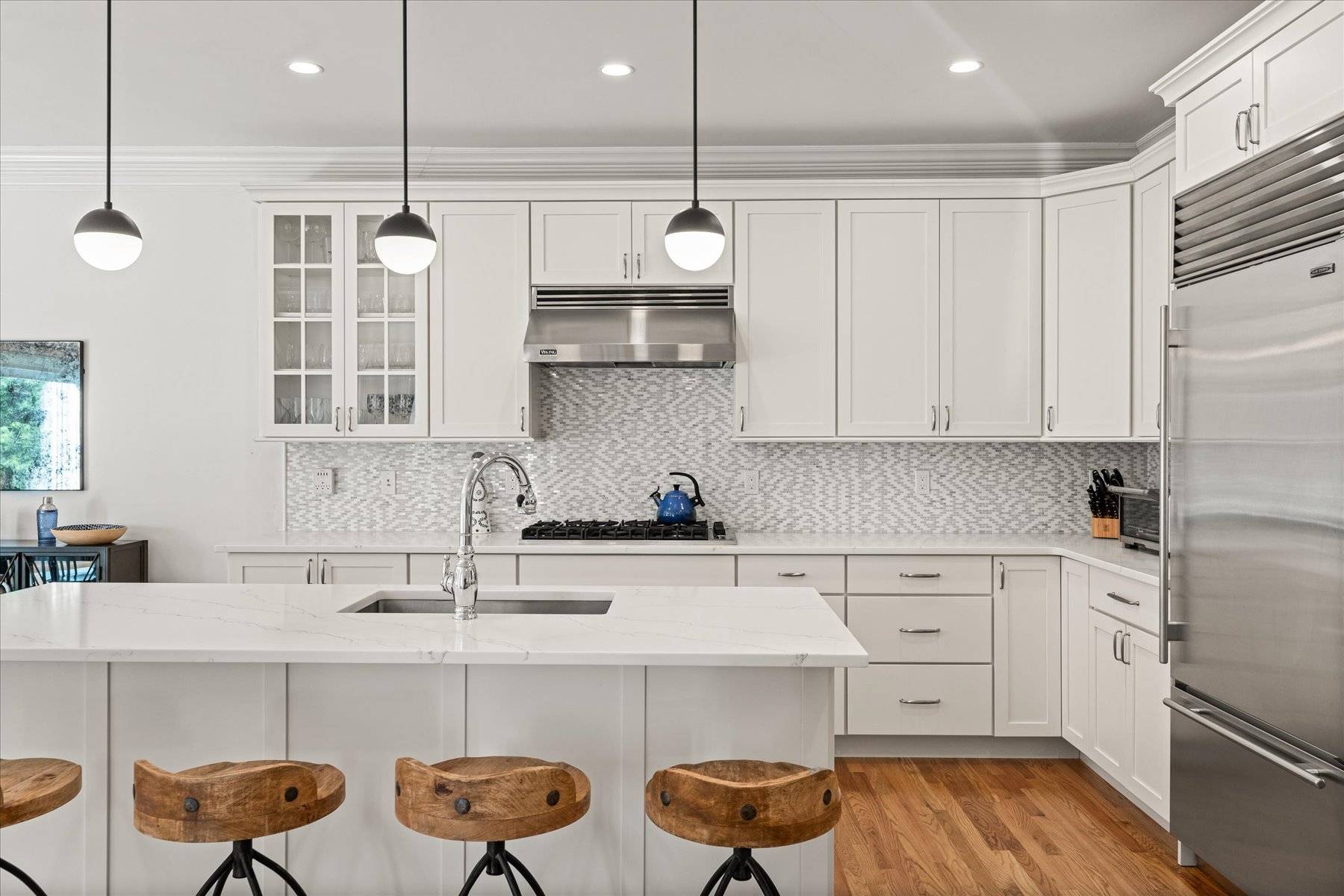 33 Post Fields Lane Quogue, NY 11959 - Photo 11 of 30 a kitchen with a sink cabinets and window