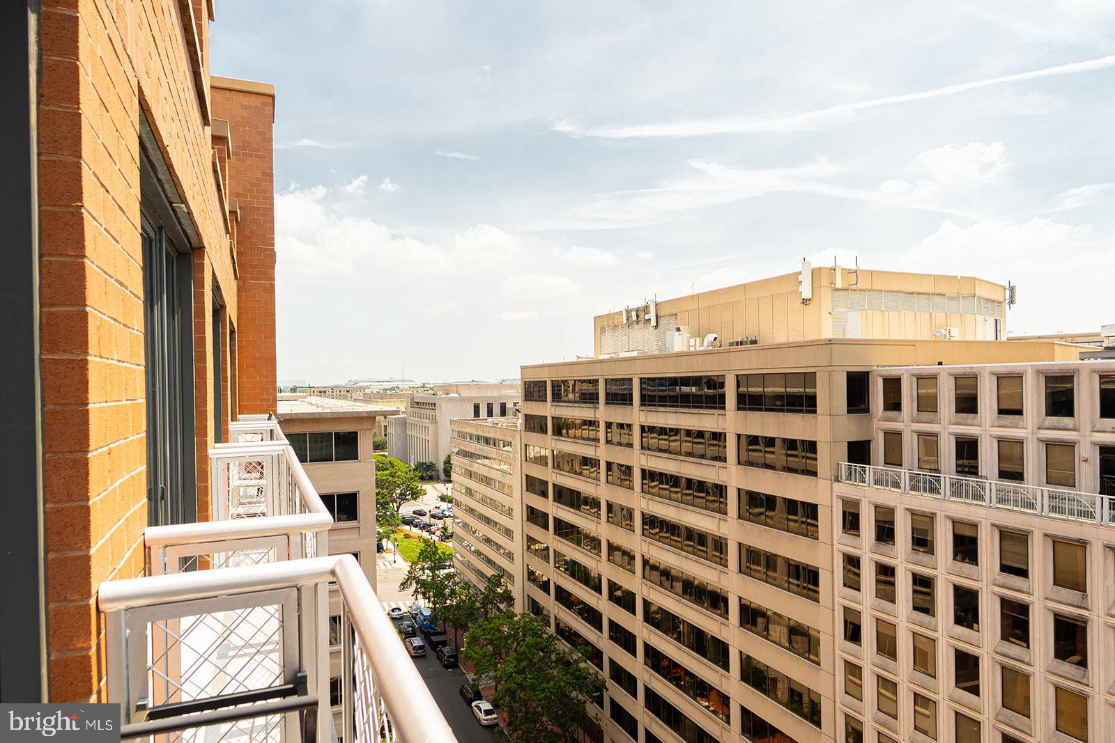 631 D Street Northwest, Unit 1231 Washington, DC 20004 - Photo 19 of 48 a view of a building with an outdoor space
