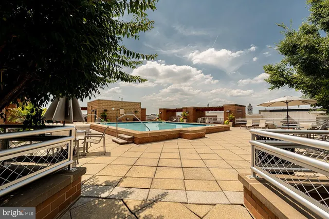 a view of a terrace with sitting area