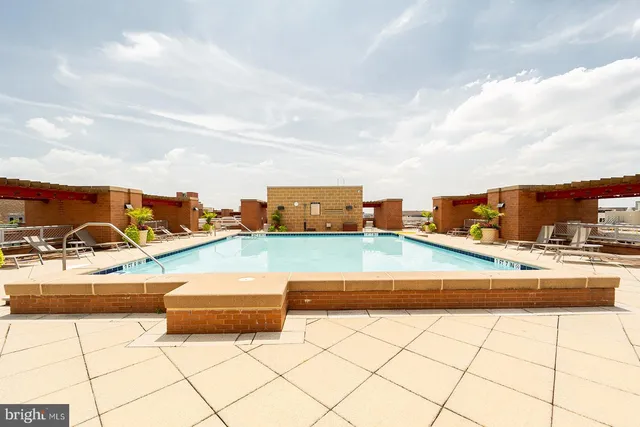 a outdoor space with lots of swings and slides