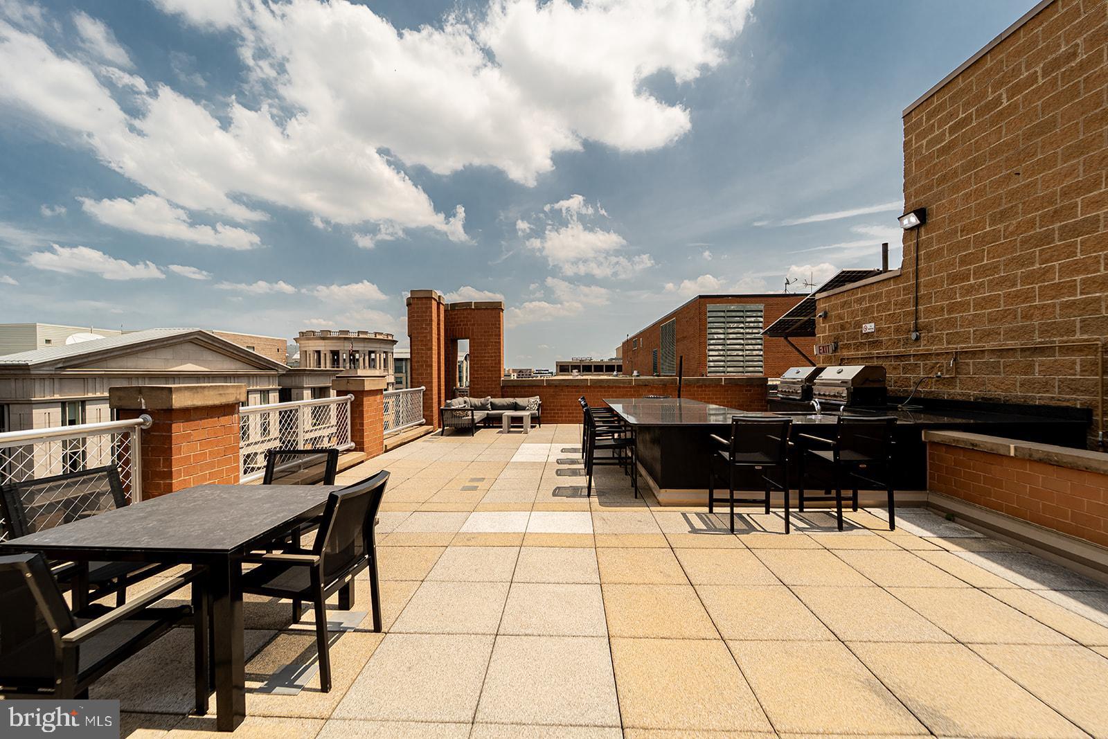 631 D Street Northwest, Unit 1231 Washington, DC 20004 - Photo 20 of 48 a view of a terrace with sitting area