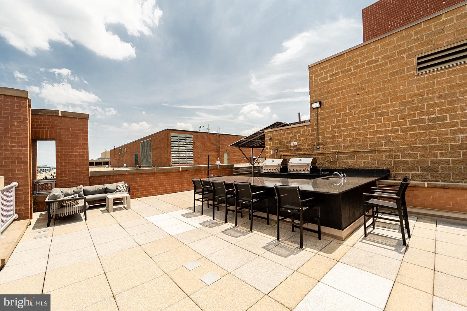 631 D Street Northwest, Unit 1231 Washington, DC 20004 - Photo 23 of 48 a view of a terrace with seating area