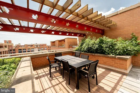 a view of a terrace with sitting area