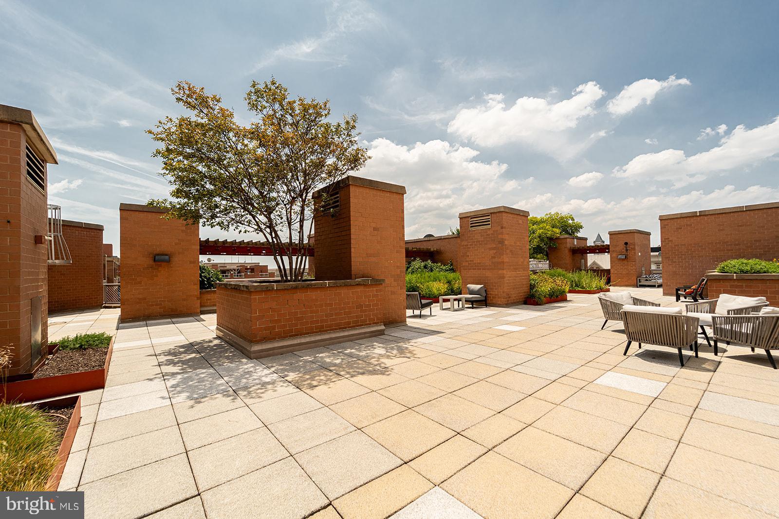 631 D Street Northwest, Unit 1231 Washington, DC 20004 - Photo 24 of 48 a view of a terrace with sitting area