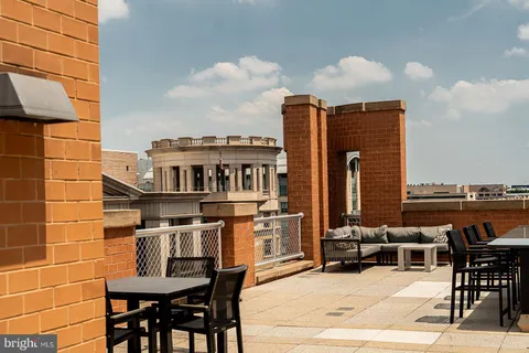 a patio with an outdoor seating