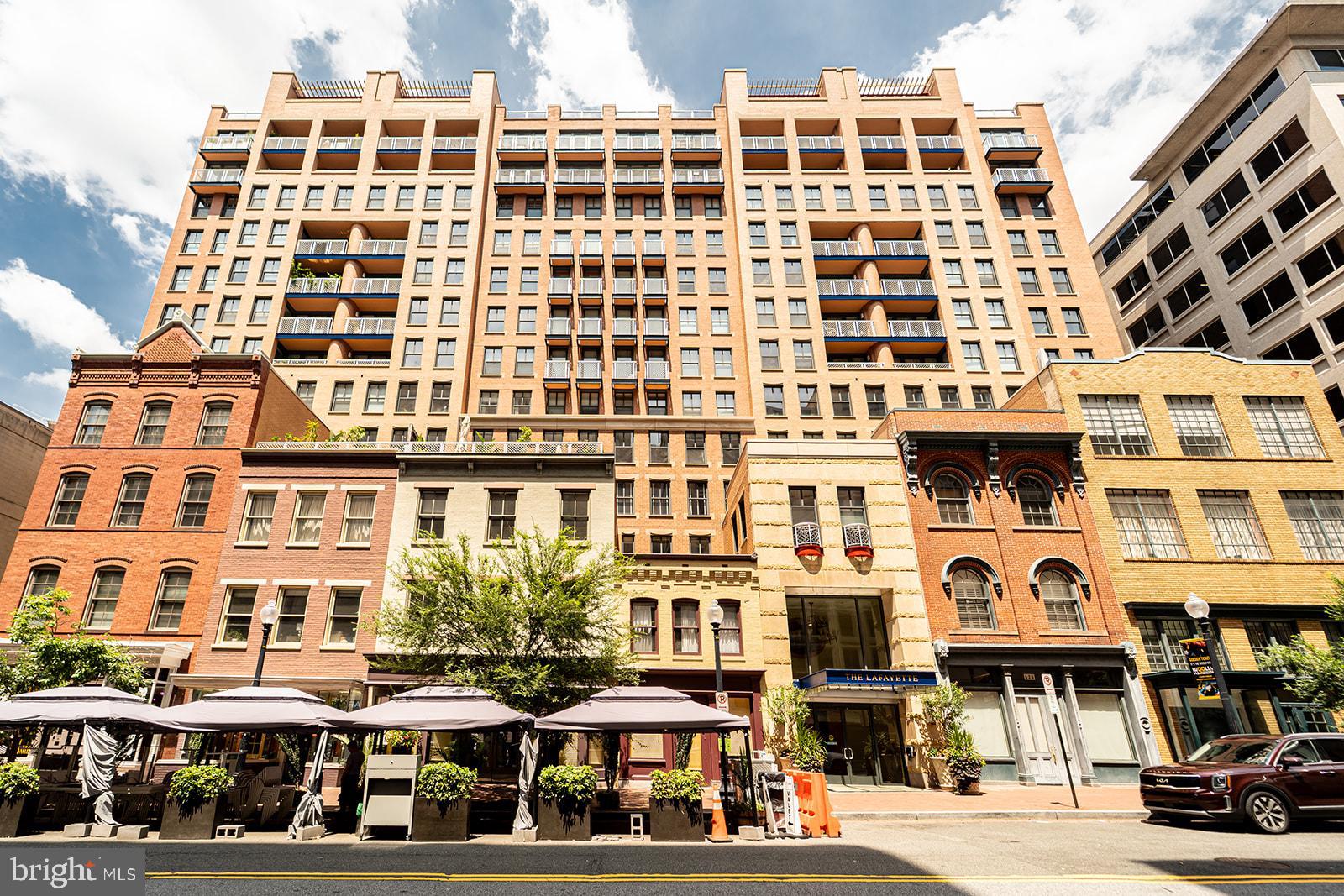 631 D Street Northwest, Unit 1231 Washington, DC 20004 - Photo 3 of 34 front view of a building with a street