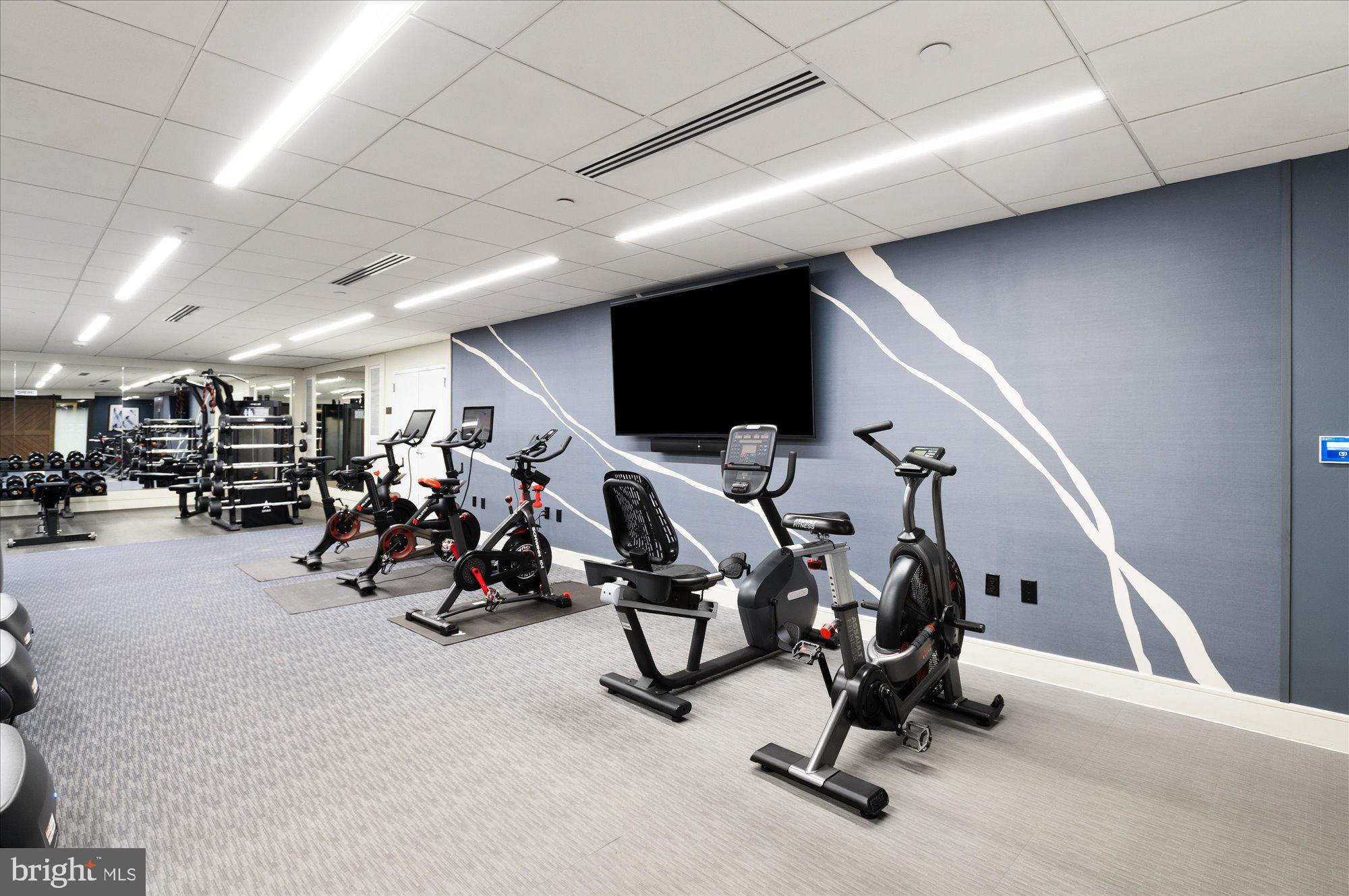 631 D Street Northwest, Unit 1231 Washington, DC 20004 - Photo 30 of 48 a view of a room with gym equipment