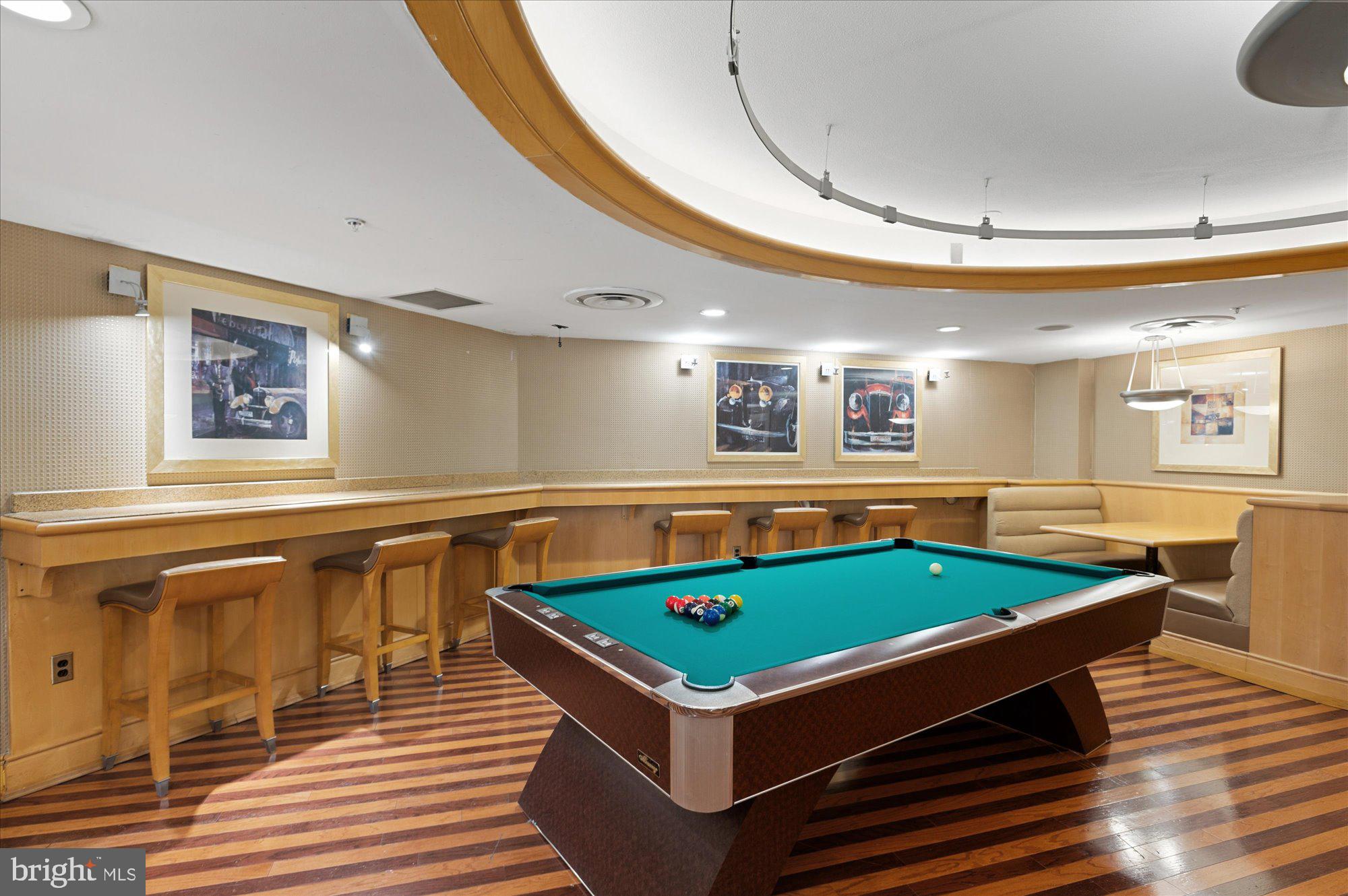 631 D Street Northwest, Unit 1231 Washington, DC 20004 - Photo 38 of 48 a room with pool table and windows
