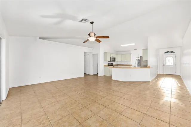 a view of a kitchen with a sink