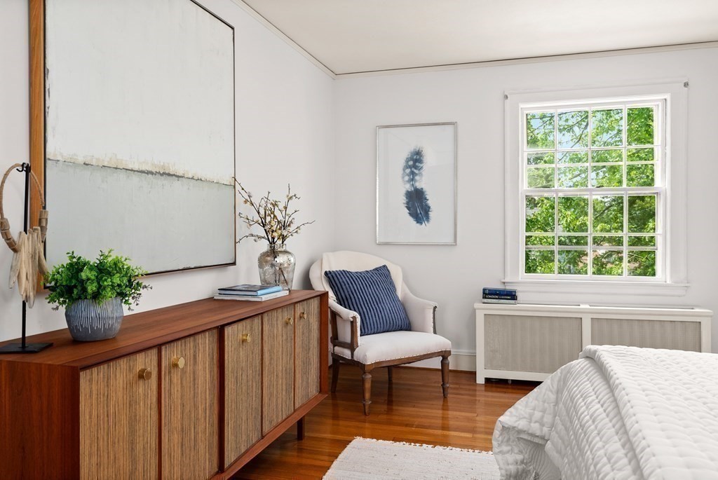 70 Edgemoor Road Belmont, MA 02478 - Photo 14 of 24 a living room with furniture and a potted plant