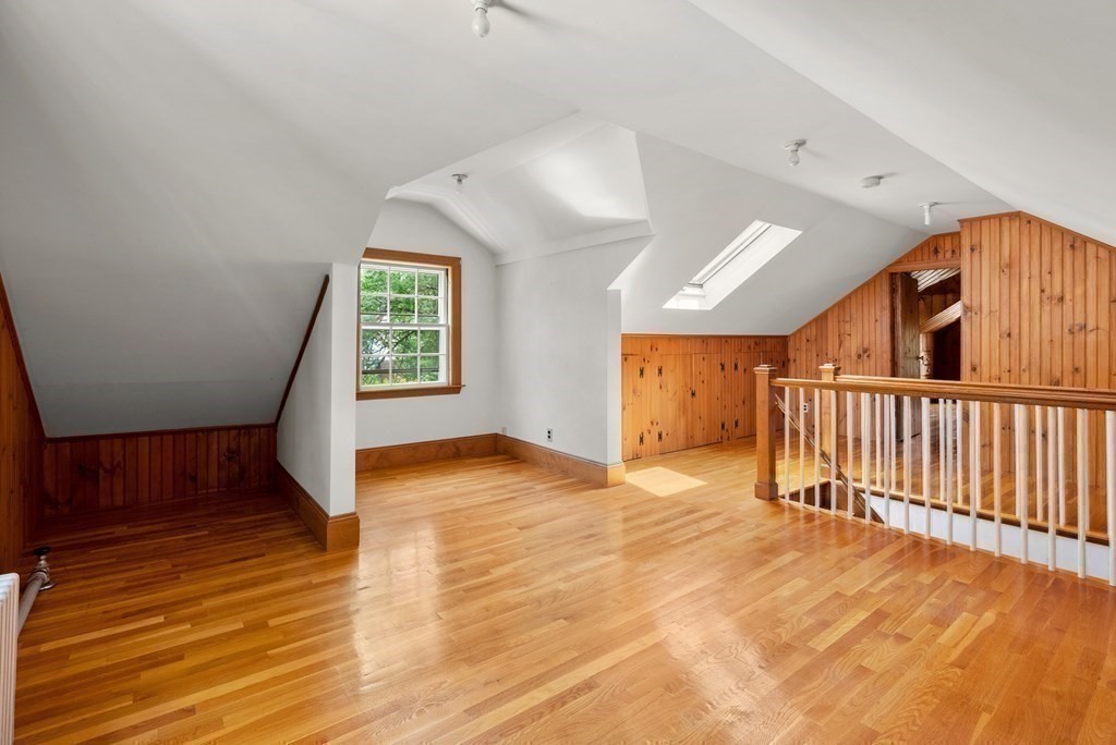 70 Edgemoor Road Belmont, MA 02478 - Photo 18 of 24 a view of an empty room with wooden floor and a window