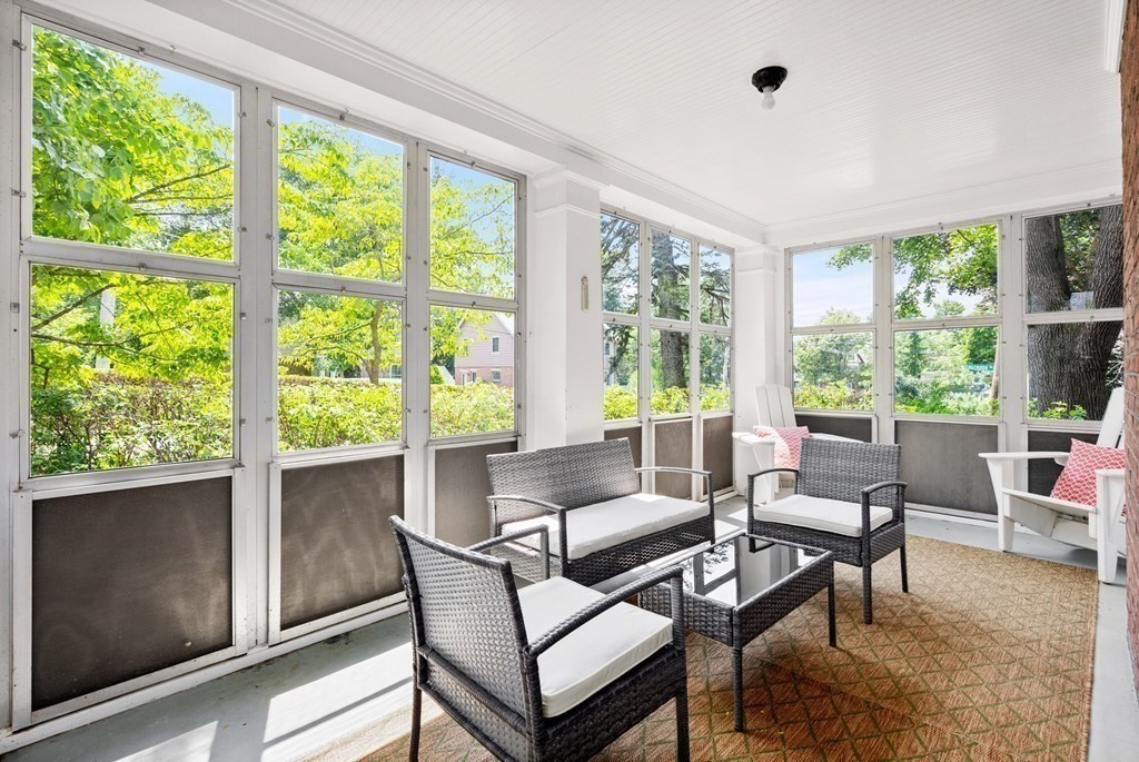 70 Edgemoor Road Belmont, MA 02478 - Photo 20 of 24 a living room with furniture and a floor to ceiling window