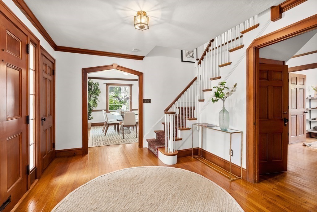 70 Edgemoor Road Belmont, MA 02478 - Photo 2 of 24 a view of a livingroom with furniture and entryway