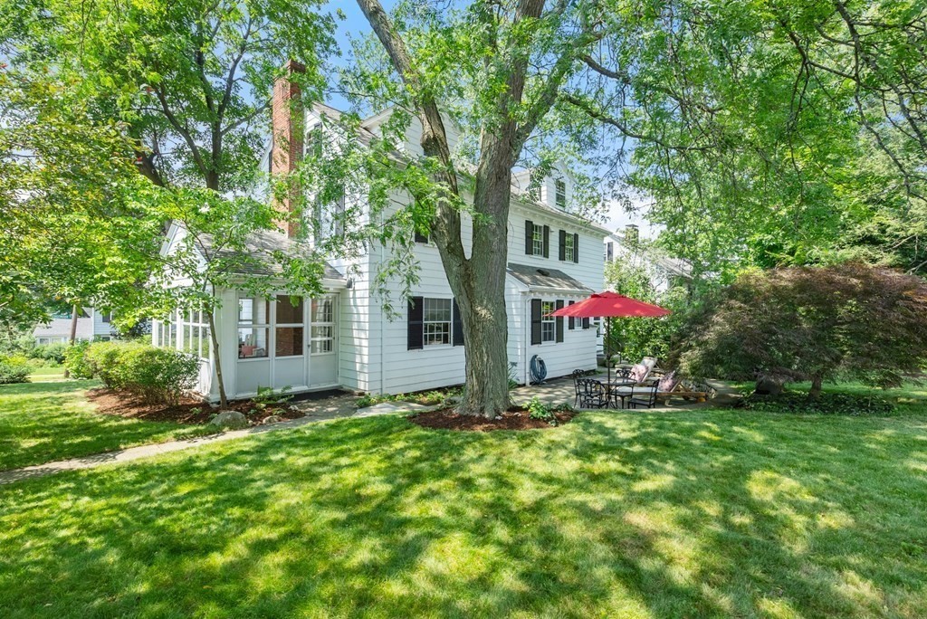 70 Edgemoor Road Belmont, MA 02478 - Photo 22 of 24 a front view of house with yard and trees