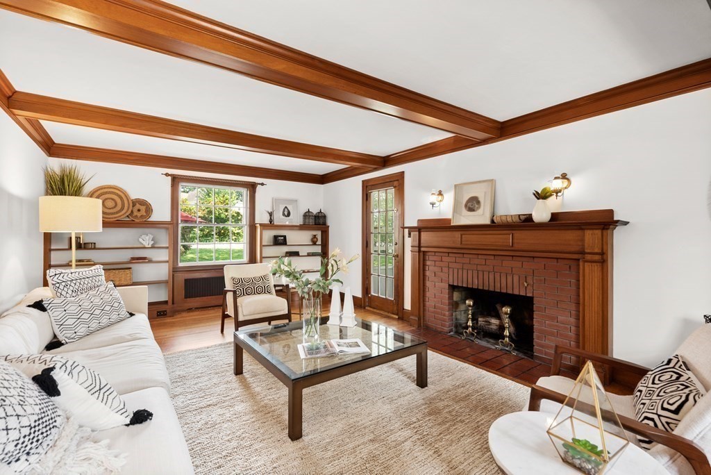 70 Edgemoor Road Belmont, MA 02478 - Photo 3 of 24 a living room with furniture and a fireplace