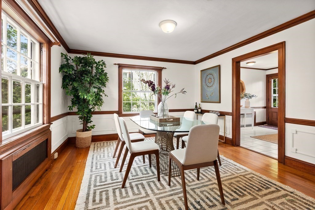 70 Edgemoor Road Belmont, MA 02478 - Photo 5 of 24 a dining room with furniture wooden floor and a rug